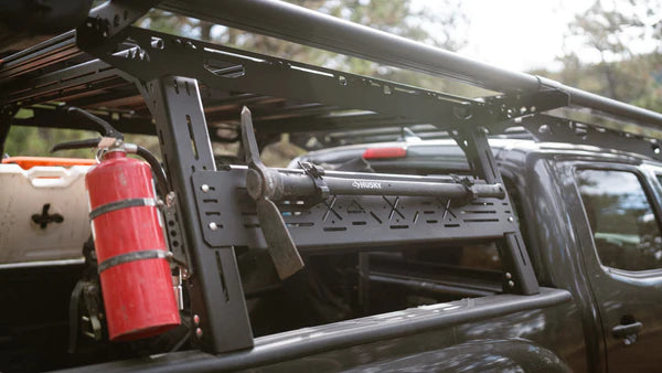 Image showing the sherpa bed rack with a pickaxe and fire extinguisher mounted
