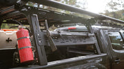 Image showing the sherpa bed rack with a pickaxe and fire extinguisher mounted