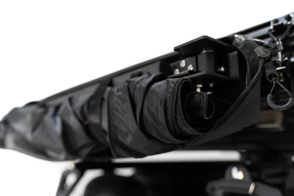 Shower Awning being unrolled 