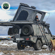 Sidewinder on top of Land Cruiser with person inside