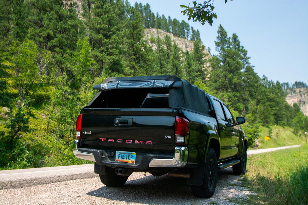 Tacoma with topper rear view