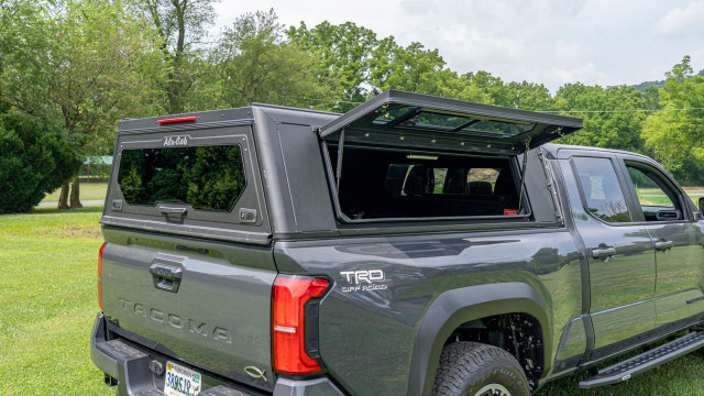 Alu-Cab Toyota Tacoma Contour Canopy With Opened Side Window