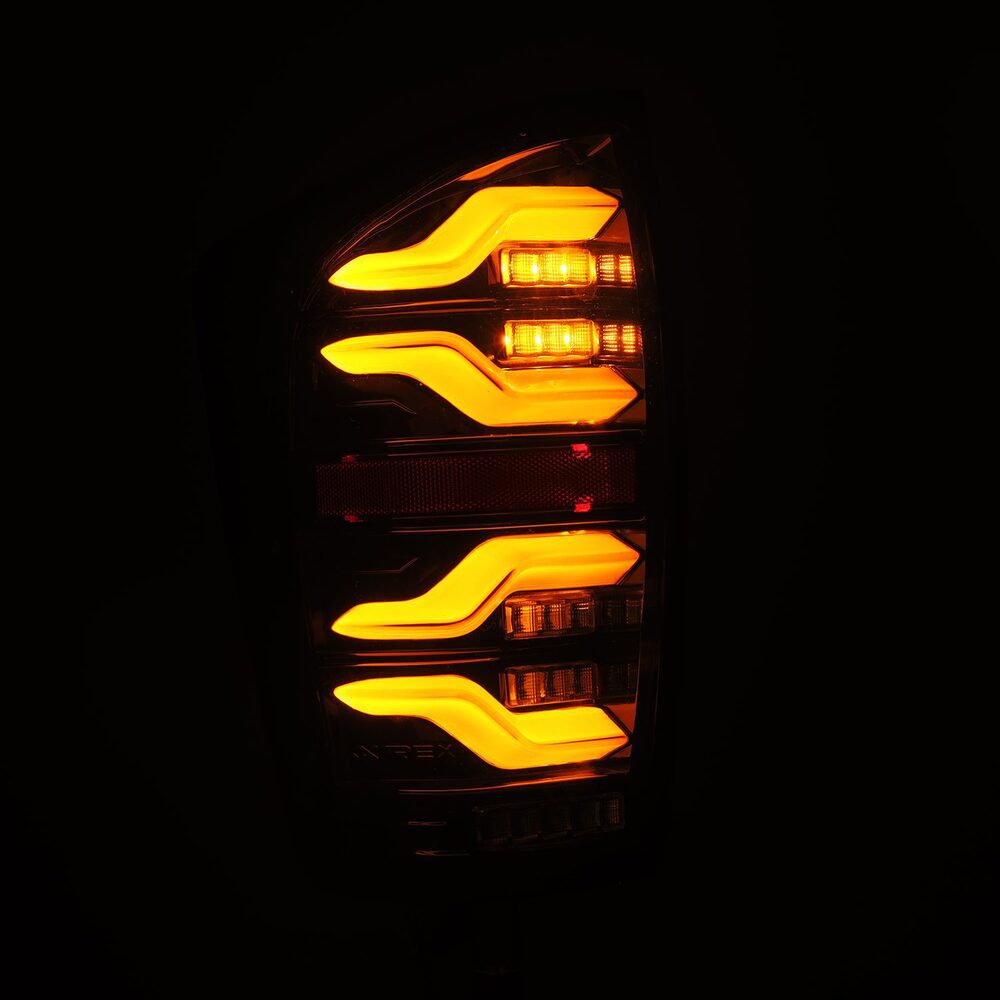 Tacoma AlphaRex LUXX Series LED Tail Lights Turned On In Yellow Color