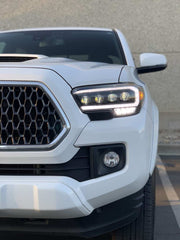 AlphaRex NOVA Series LED Headlights Mounted On A Tacoma And Turned On