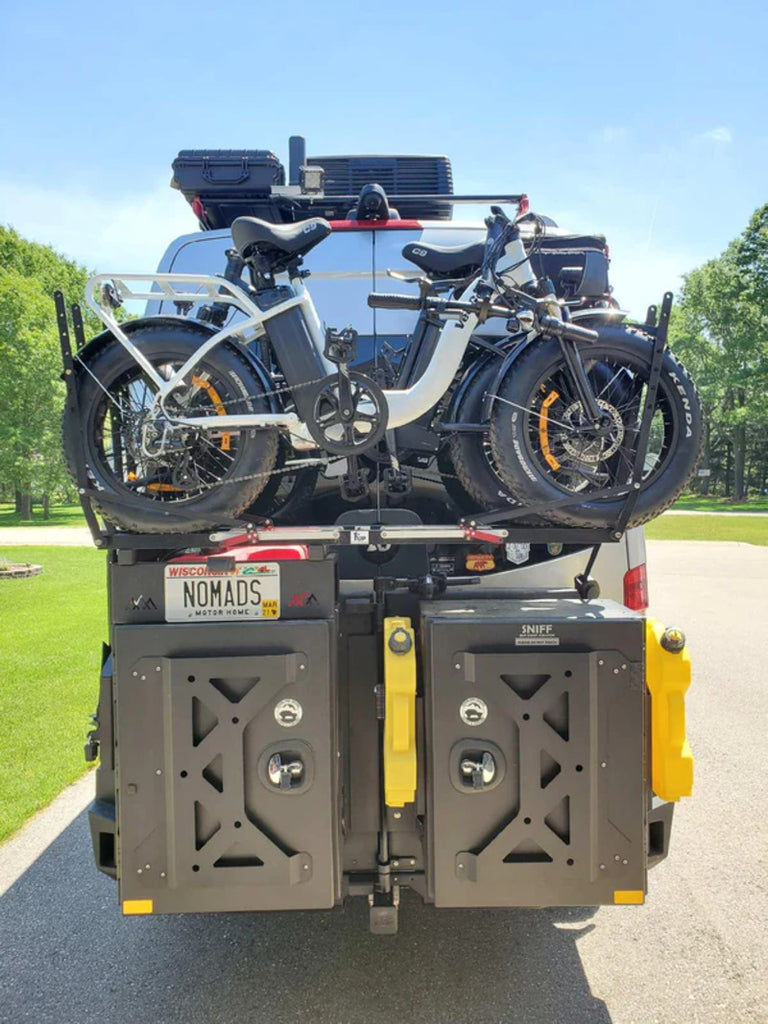 Backwoods Aluminum Cabinet Storage Boxes With Bikes Mounted On Top Of Them
