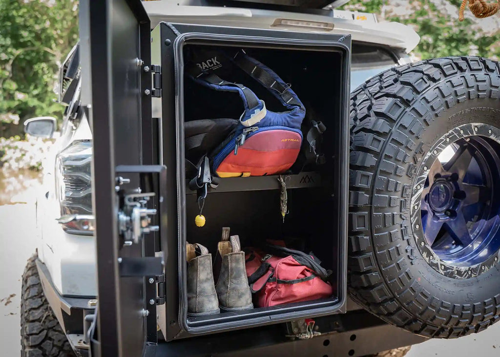 Backwoods Overland Storage Box interior showing adjustable shelf and cargo storage