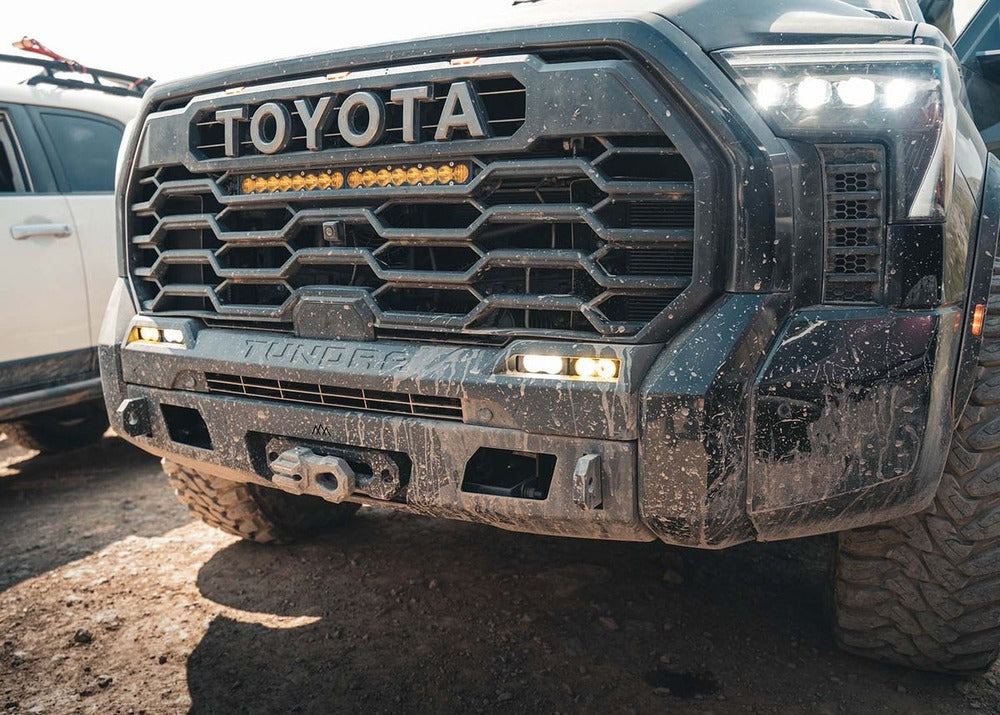 Close Up View Of The Backwoods Tundra Scout Front Bumper With The Lights Turned On