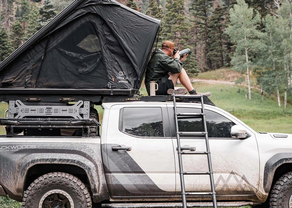 Man sitting on DRIFTR roof rack