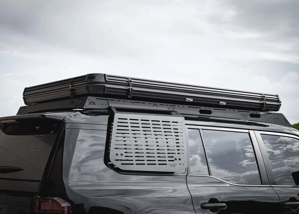 Toyota Land Cruiser 250 with DRIFTR roof rack and rooftop tent mounted