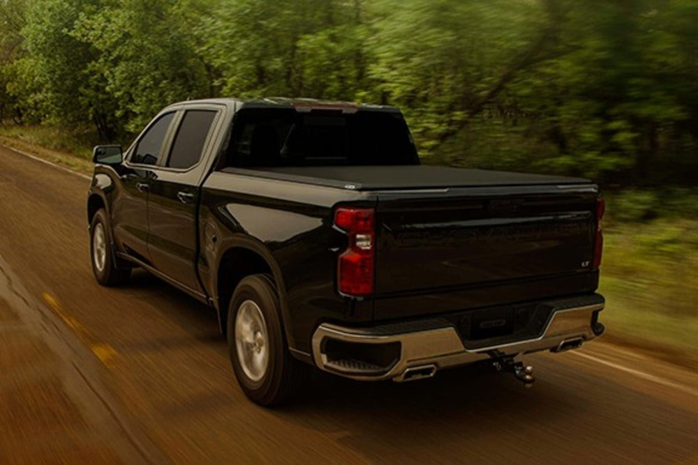 Fas-Top Traveler Truck Tonneau & Topper For GMC With The Topper Stowed Under The Tonneau Cover