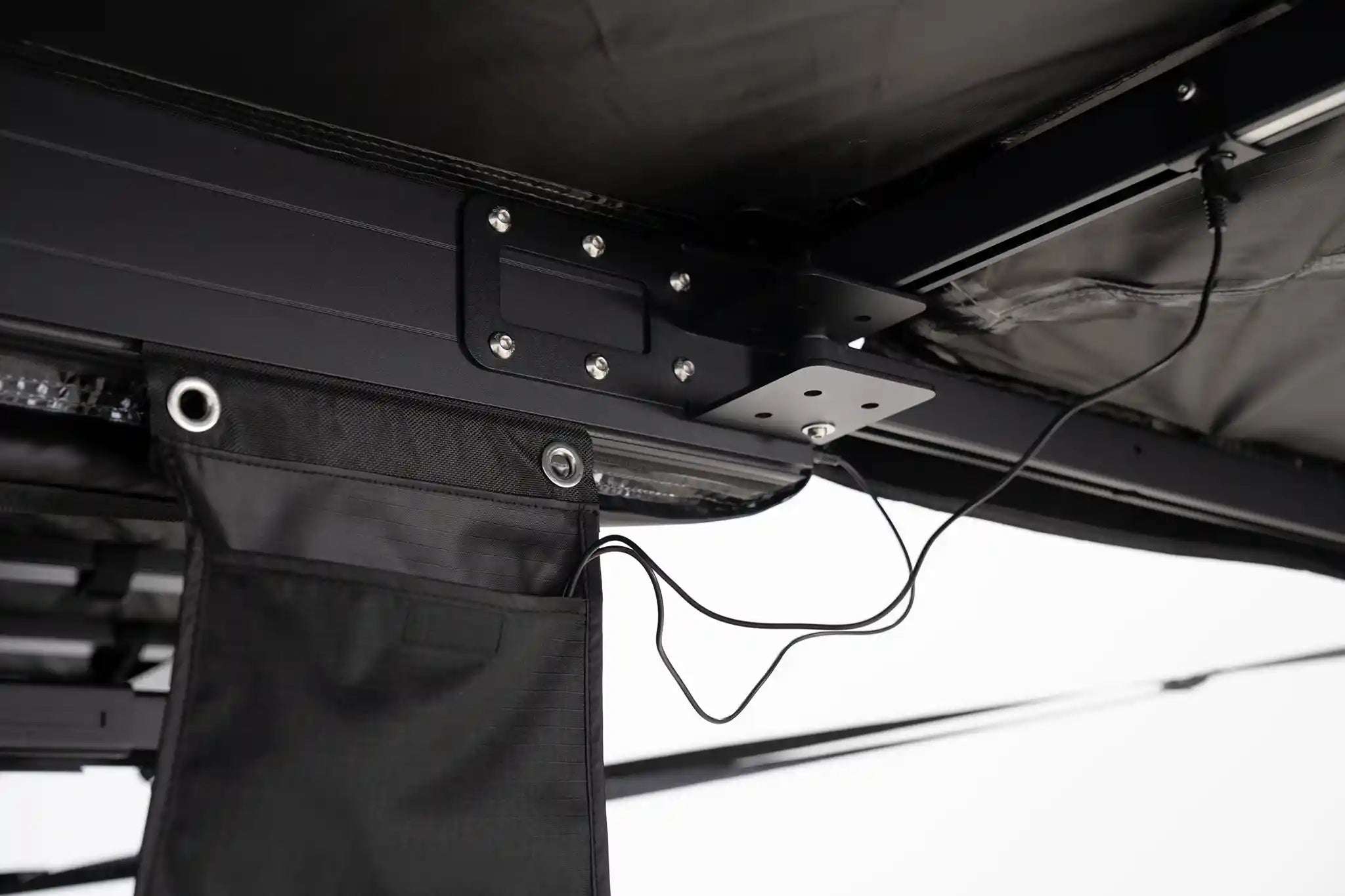 FSR 180 Tailgate Awning showing integrated dimmable LED lighting and storage over the tailgate area