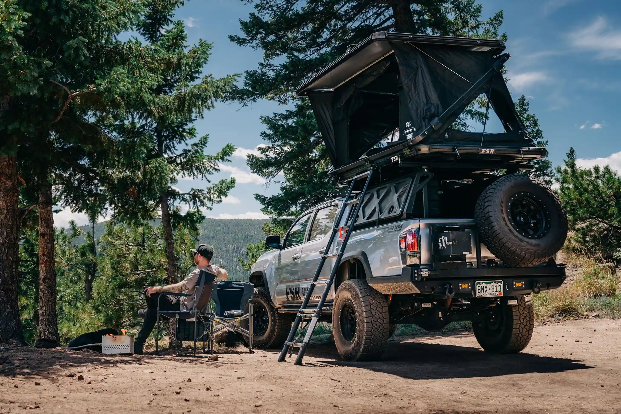 FSR Evolution XL hard top roof top tent set up on a full size truck for overland camping