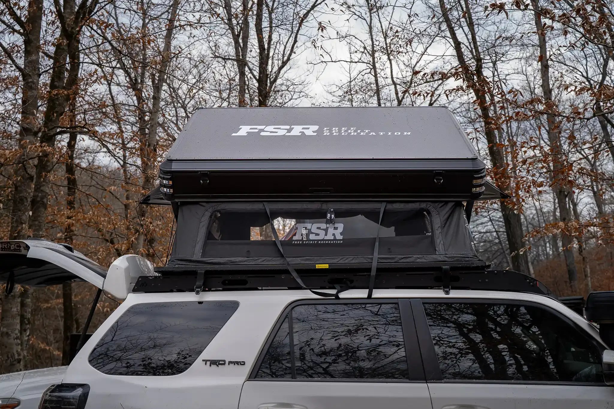FSR Kali King pop up rooftop tent open at camp showing large rear window and mesh panel