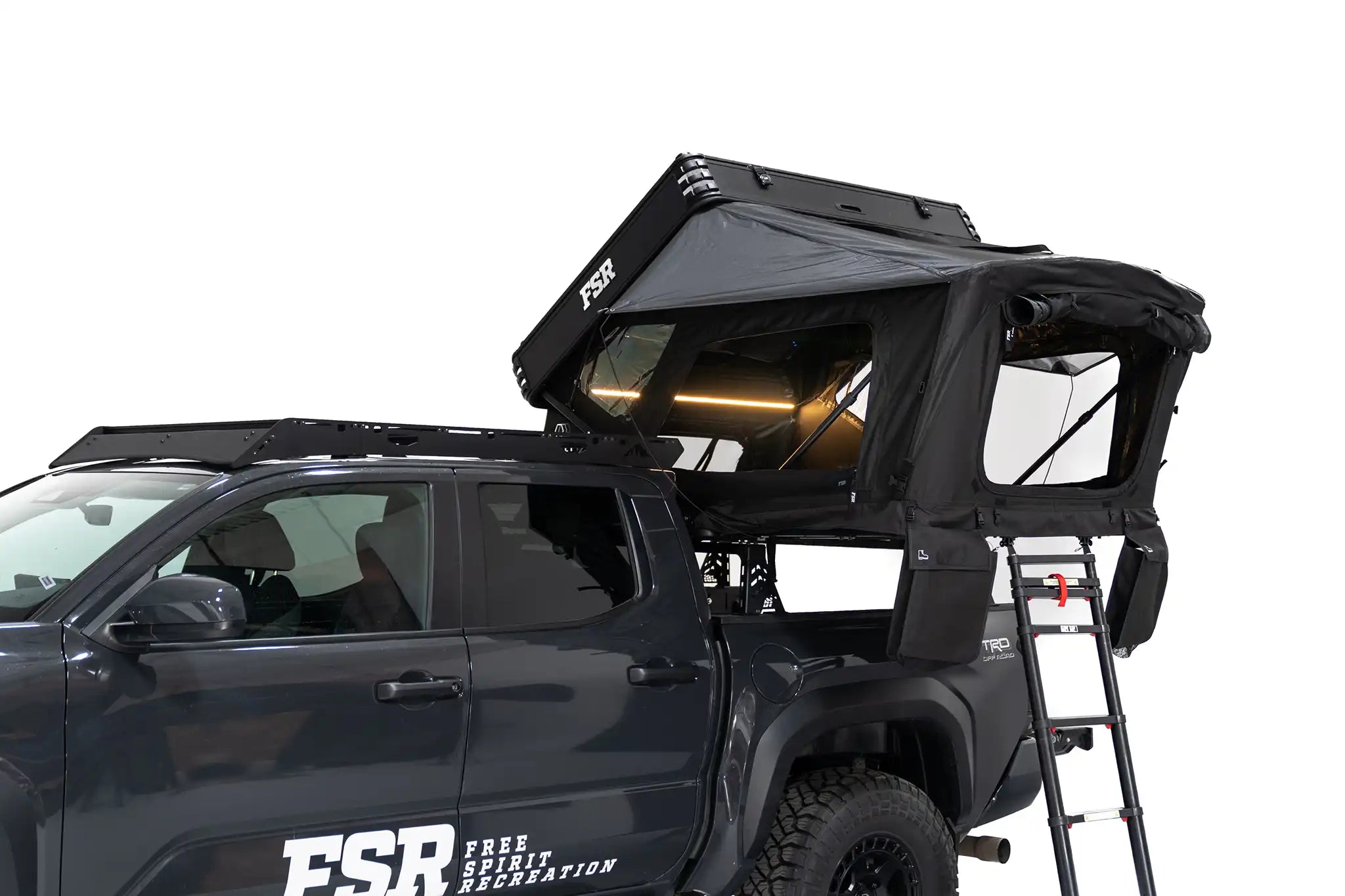FSR Kali rooftop tent mounted on a truck bed rack fully opened with ladder extended