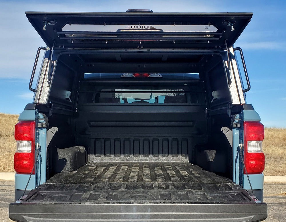 Back View Of The GAIA Campers Ford Maverick Truck Cap With The Open Door