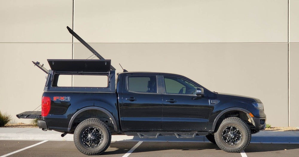 Side View Of The Installed GAIA Campers Ford Ranger Truck Cap With Opened Doors