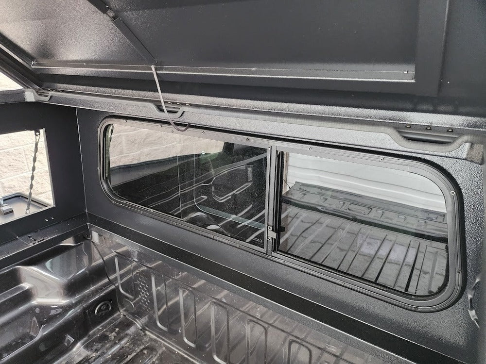 Rear View Window Of The GAIA Campers  Gladiator Shadow Top Truck Cap