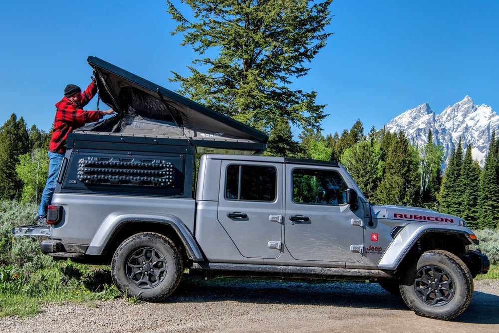 Person Setting Up The GAIA Camper