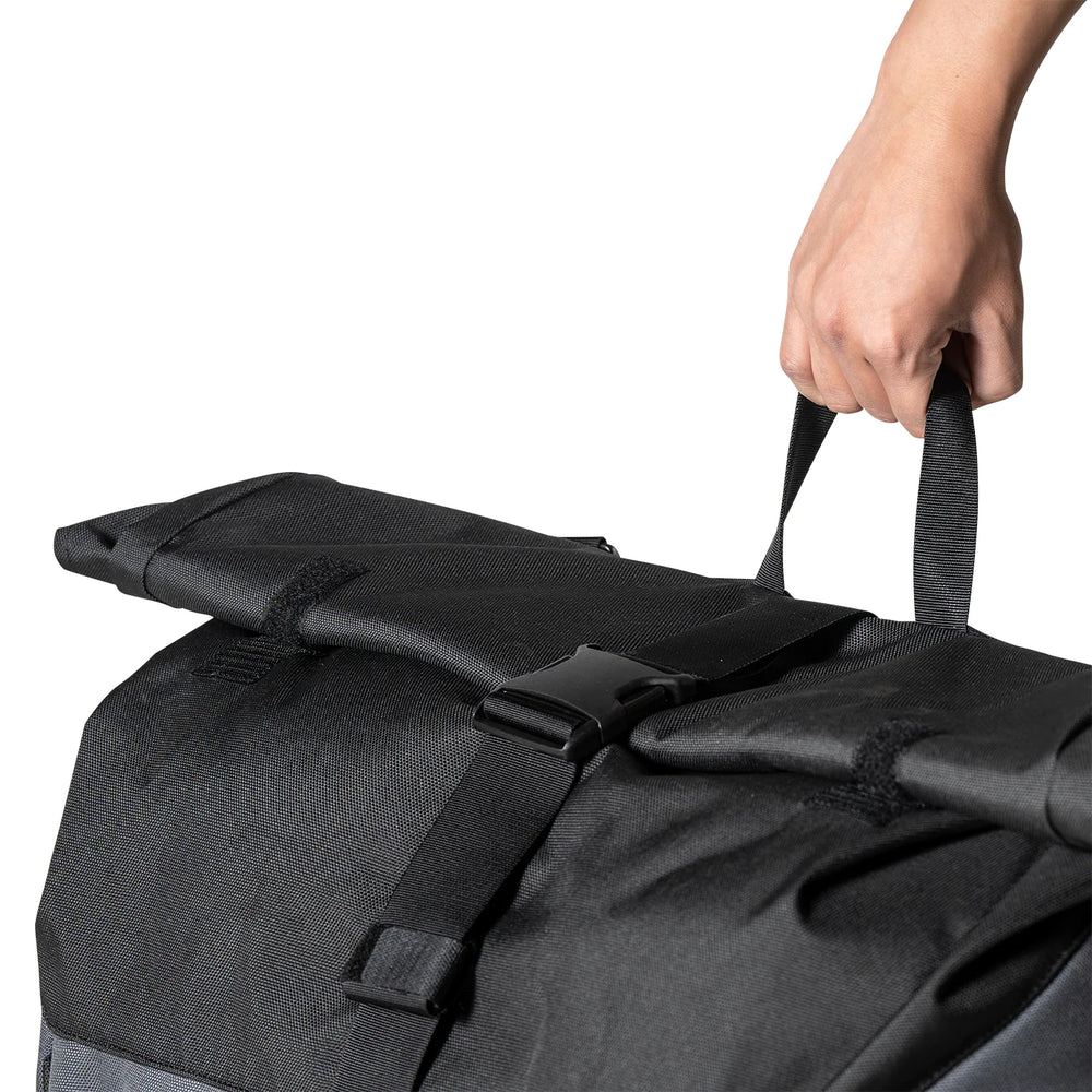 image showing a person carrying the iKamper trash caddy