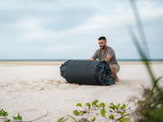 Person Unfolding The Kakadu Sundowner Swag Tent