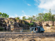 Person Laying Inside The Kakadu Sundowner Swag Tent