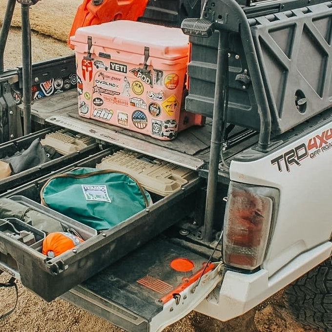 leitner active cargo system tonneau over toyota tacoma white truck