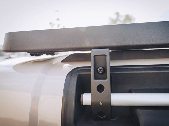 feet of the Leitner Designs ACS Roof Rack 3/4 Platform Ineos Grenadier 2024+