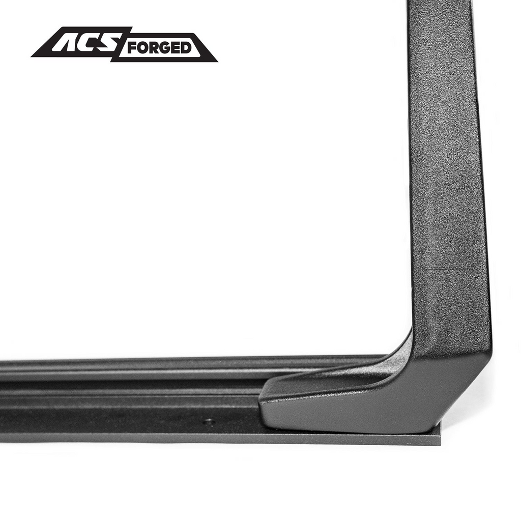 Extreme close-up of the forged aluminum upright support meeting the base rail of the ACS Forged bed rack, showcasing the textured black finish.