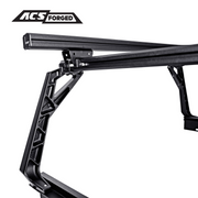 Side perspective of the ACS Forged bed rack structure, showing the geometric cutouts in the forged uprights and the sliding load bar at the top.