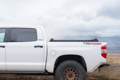 Side view of the RCI low pro bed bars  mounted on a truck