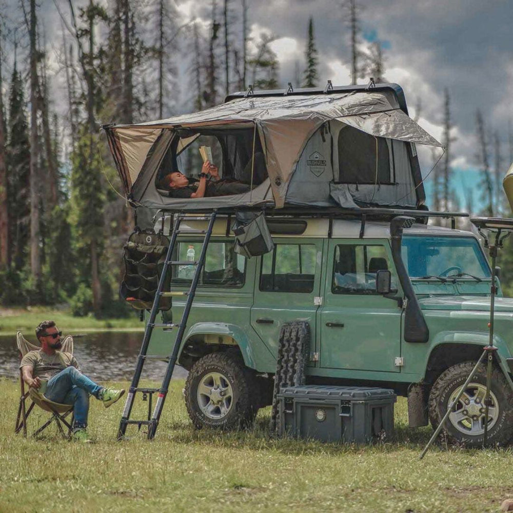 OVS Bushveld Hard Shell Roof Top Tent over a land rover defender