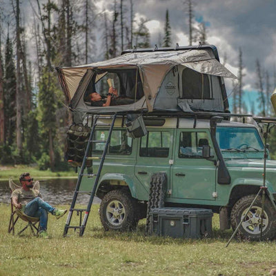 OVS Bushveld Hard Shell Roof Top Tent over a land rover defender