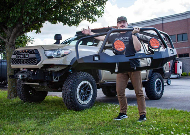A Person Holding A Backwoods 3rd Gen Tacoma Front Bumper