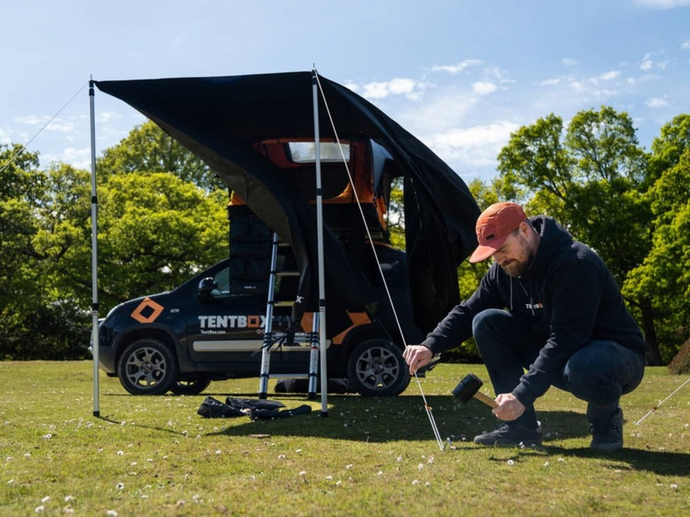 Person Setting Up The TentBox Lite 2.0 Tunnel Awning