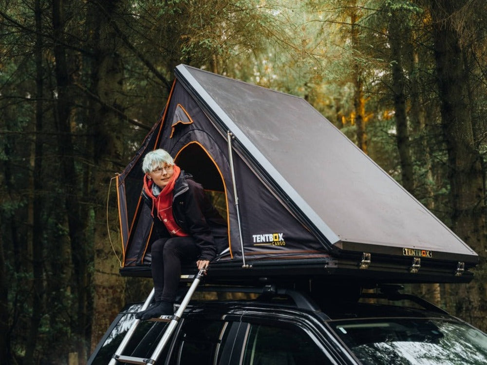 A Person Sitting On The TentBox Cargo 1.0 Side Opening