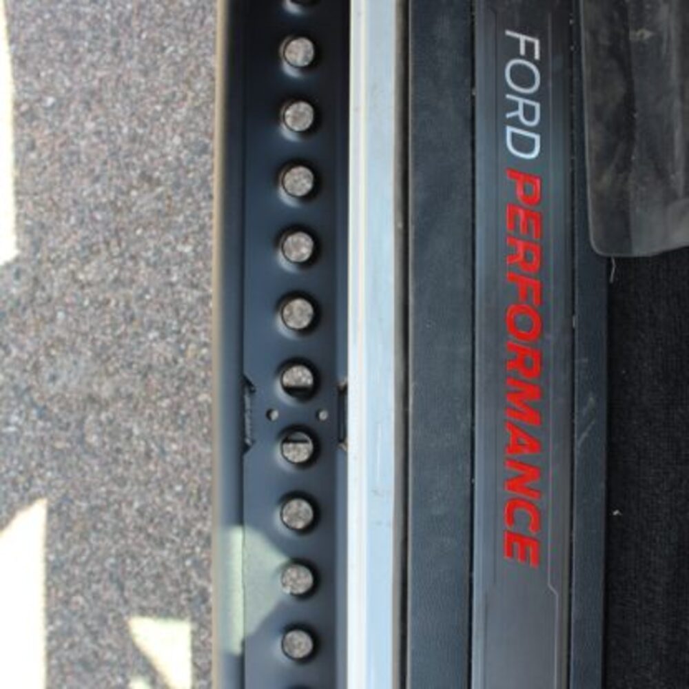 Close Up View Of The RCI Ford F150 Rock Sliders With Step Plate