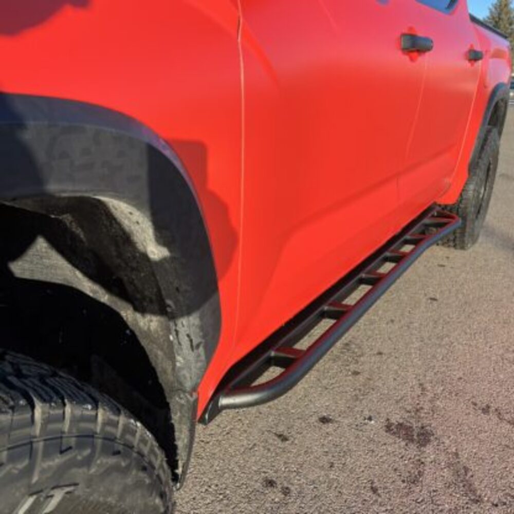 Front View Of The Mounted RCI Toyota Tundra Rock Sliders With No Step Plate