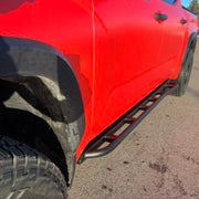 Front View Of The Mounted RCI Toyota Tundra Rock Sliders With No Step Plate