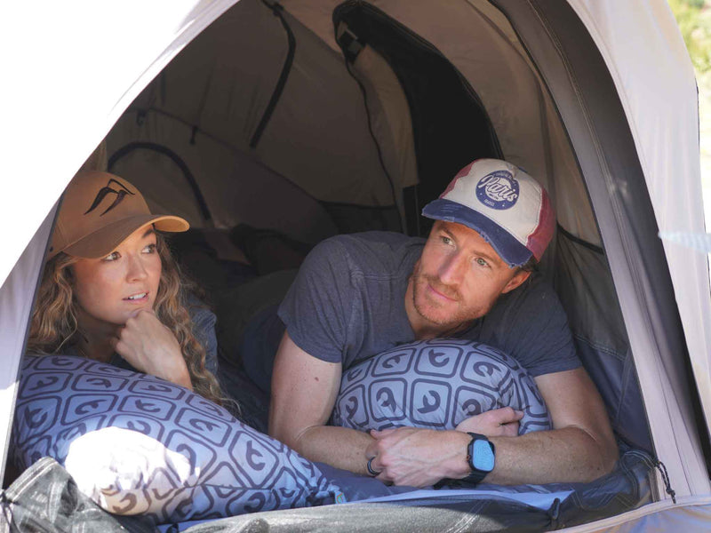REV Tent Gen 2 interior couple lifestyle shot showing spacious 2 person layout