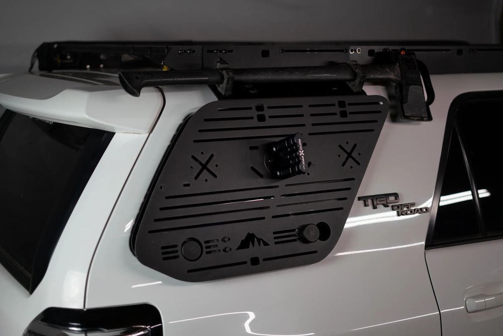 Axe And Rotopax Mount On The Sherpa 5th Gen 4Runner Window Panel