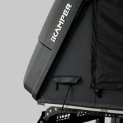 iKamper Skycamp 4.0 Duo rooftop tent mounted on SUV at campsite