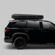 Skycamp 4.0 Quad hardshell rooftop tent at sunset campsite