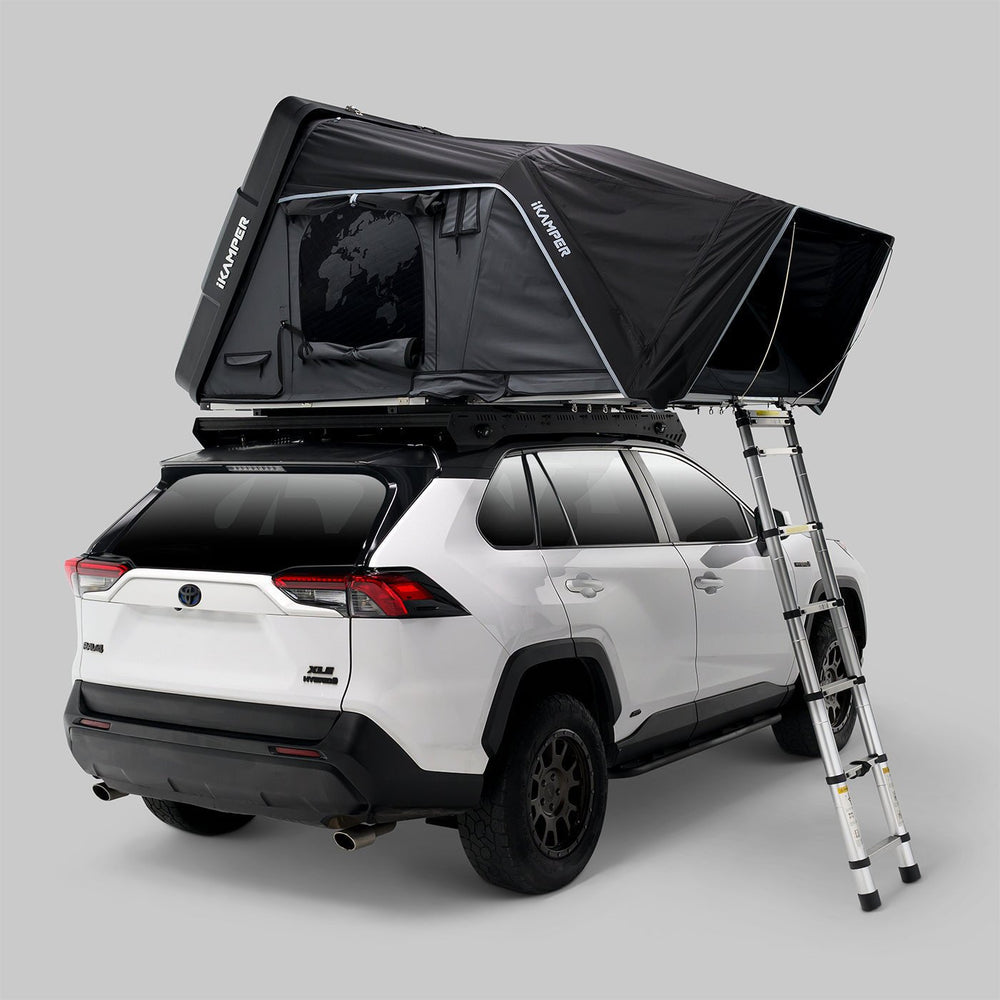 Skycamp 4.0 Trio hardshell rooftop tent open at campsite