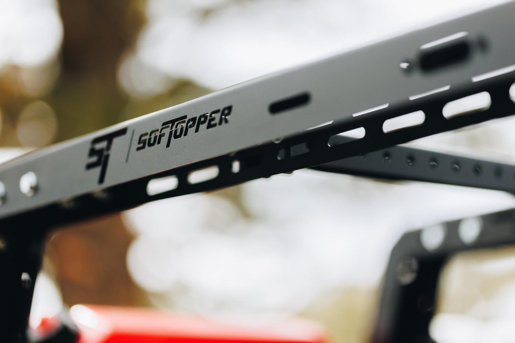 Close Up View of the SofTopper logo cut into the SofTopper Exo Truck Bed Rack