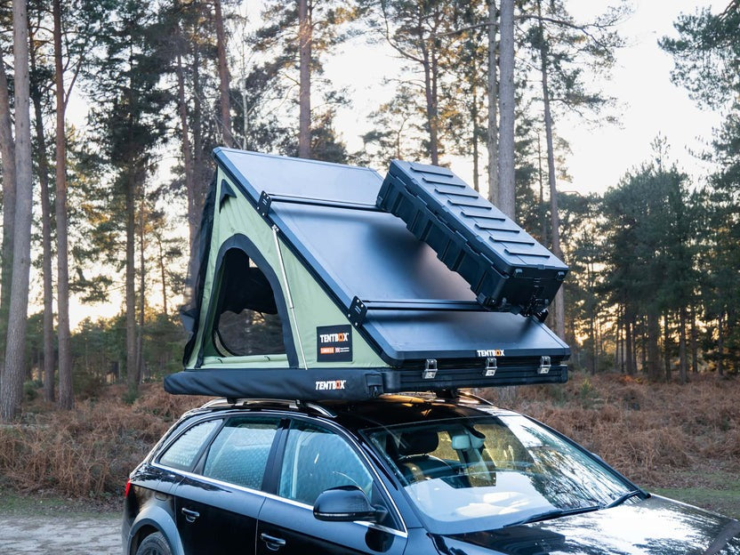 TentBox Cargo Roof Bars 2.0 With A Storage Box Attached To It