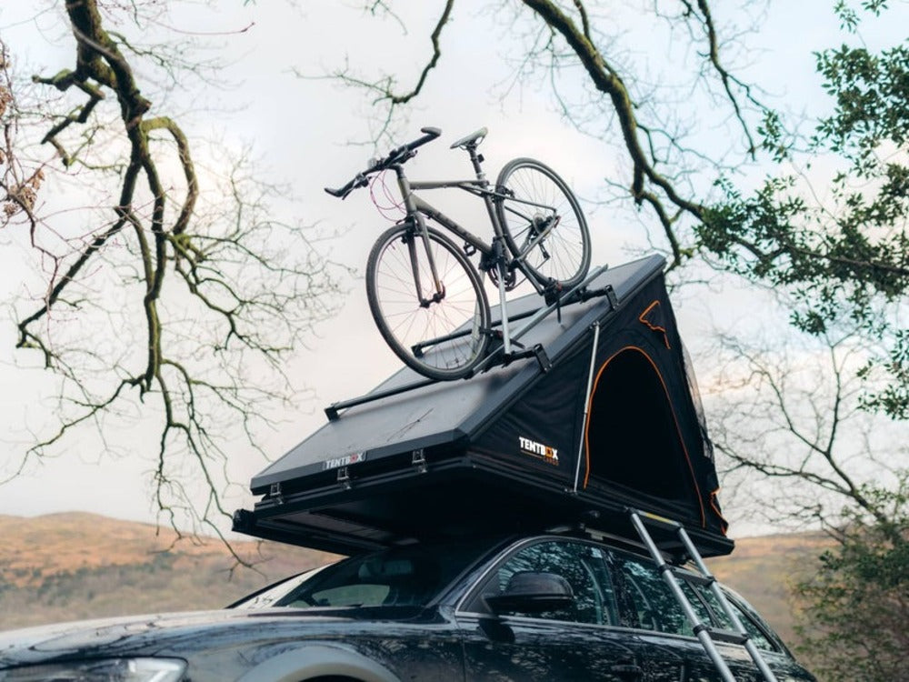 TentBox Cargo 1.0 With A Bike Mounted On The Additional Roof Bars