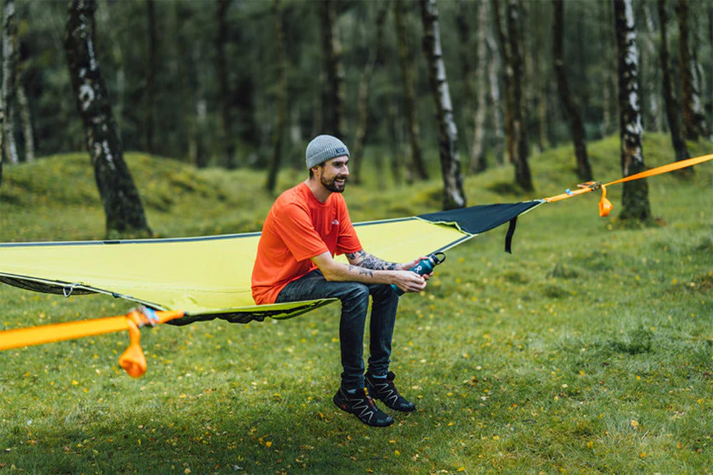 A Person Sitting On A Tentsile Duo 2 Person Double Camping Hammock