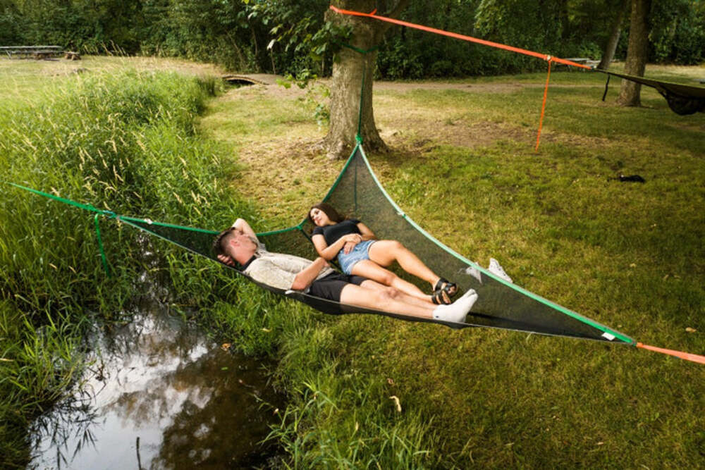 2 People Laying Inside The Tentsile T-Mini Green 2 Person Camping Hammock