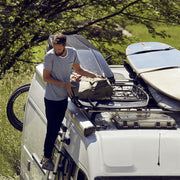 Thule Canyon XT Mounted On A Van And Being Loaded Up With Items