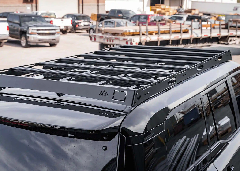 DRIFTR LC250 roof rack with T-track load bars and accessory mounts on Land Cruiser 250